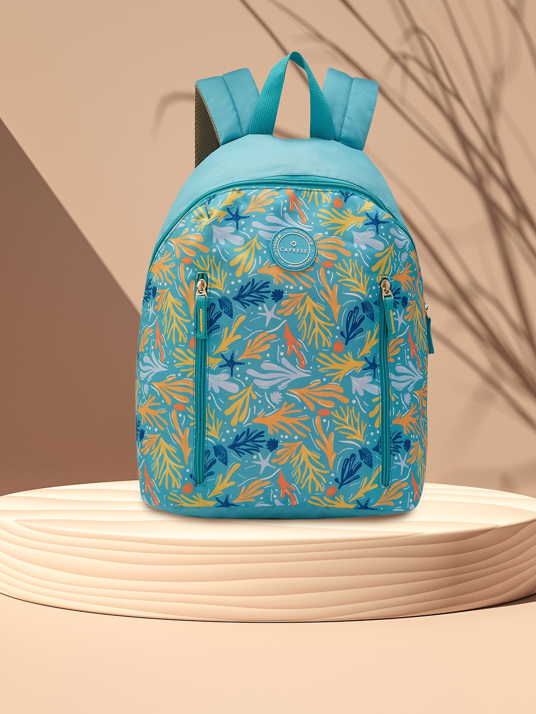 

Caprese Women Xenia Tropical Printed Backpack, Turquoise blue