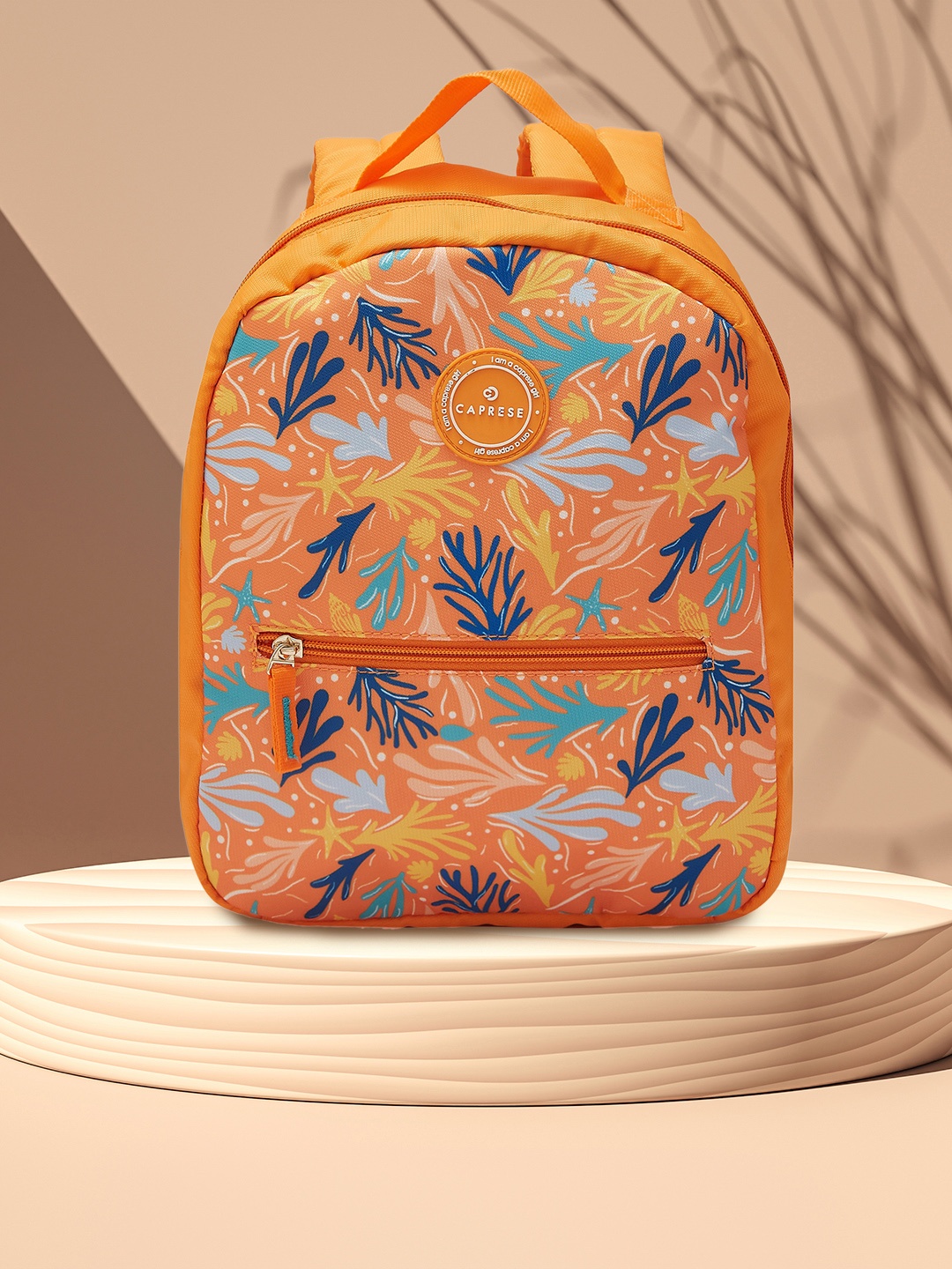 

Caprese Women Xenia Tropical Printed Backpack, Orange