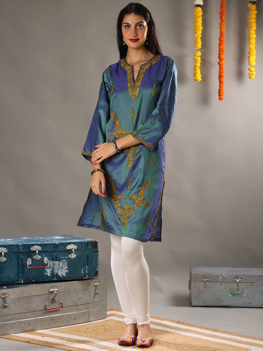 

Exotic India Aqua Blue Aari Embroidered Art Silk Kurti with Traditional Kashmiri Motifs
