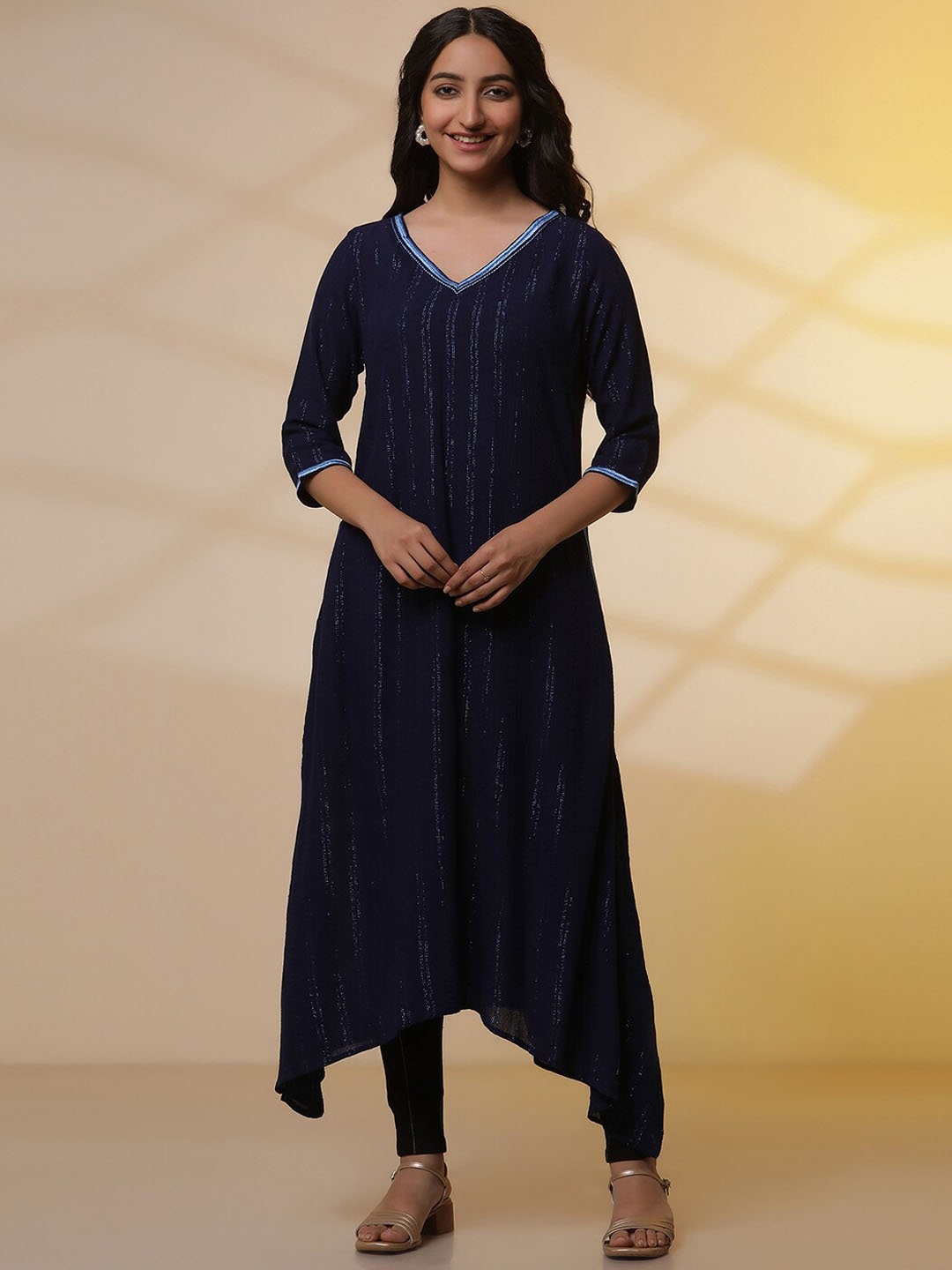 

AURELIA Striped Thread Work V-Neck Zari Asymmetric A-Line Kurta With Jeggings, Blue