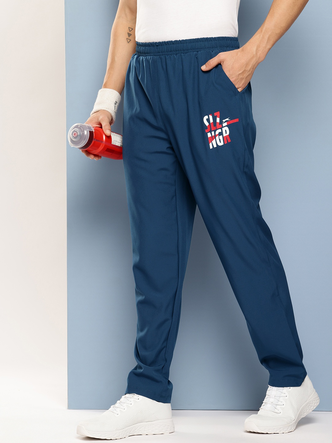

Slazenger Men Brand Logo Printed Ultra Dry Training Track Pants, Blue