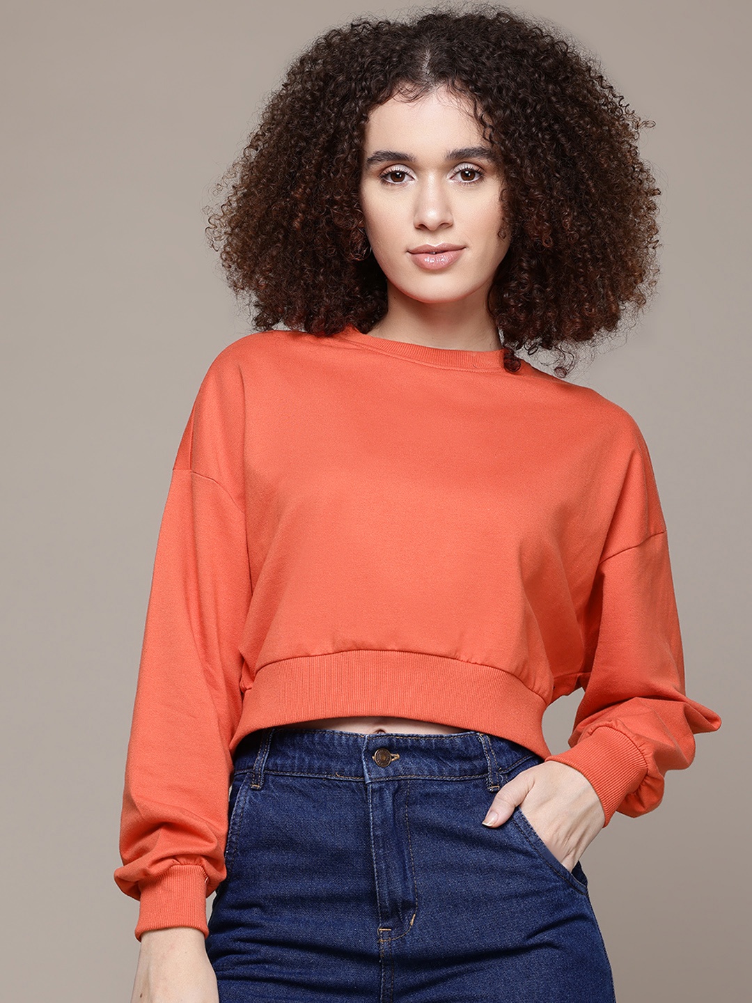 

The Roadster Lifestyle Co. Women Crop Sweatshirt, Orange