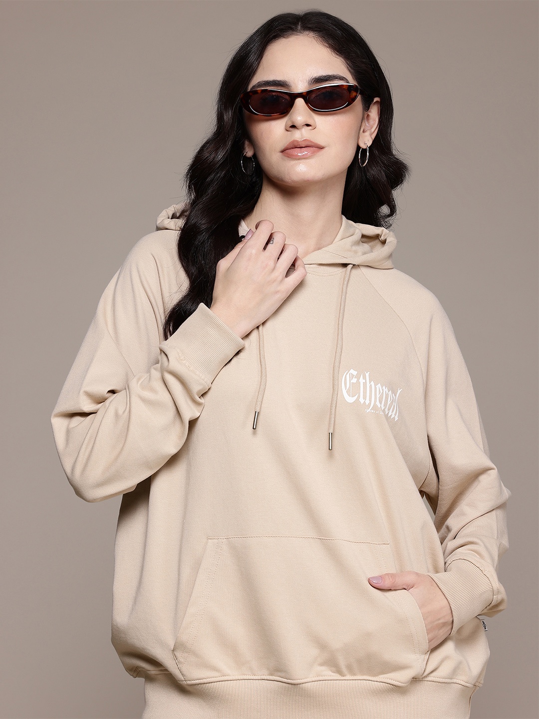 

Roadster The Life Co. Graphic Printed Hooded Longline Sweatshirt, Beige