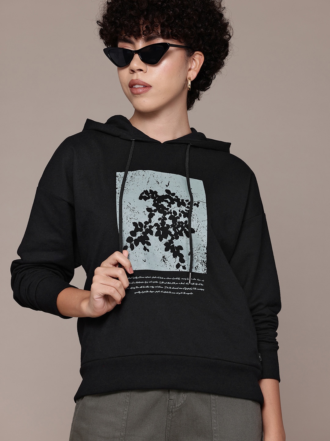 

The Roadster Lifestyle Co. Women Printed Hooded Sweatshirt, Black