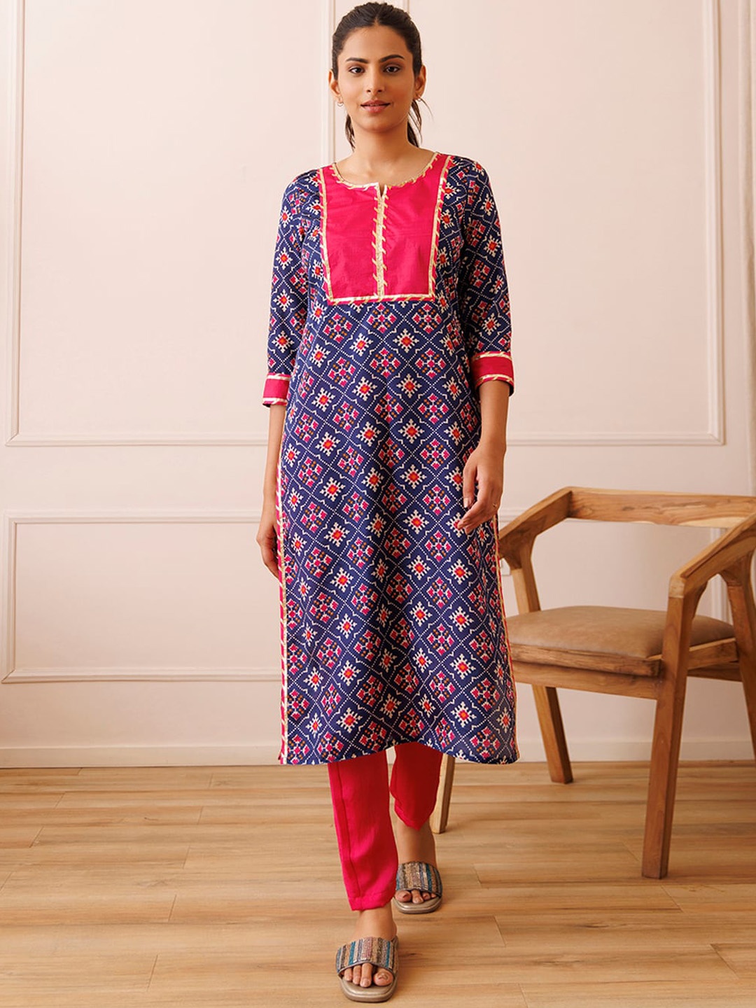 

Ragavi Ethnic Motifs Printed Notch Ncek Gotta Patti Straight Kurta With Trousers, Blue