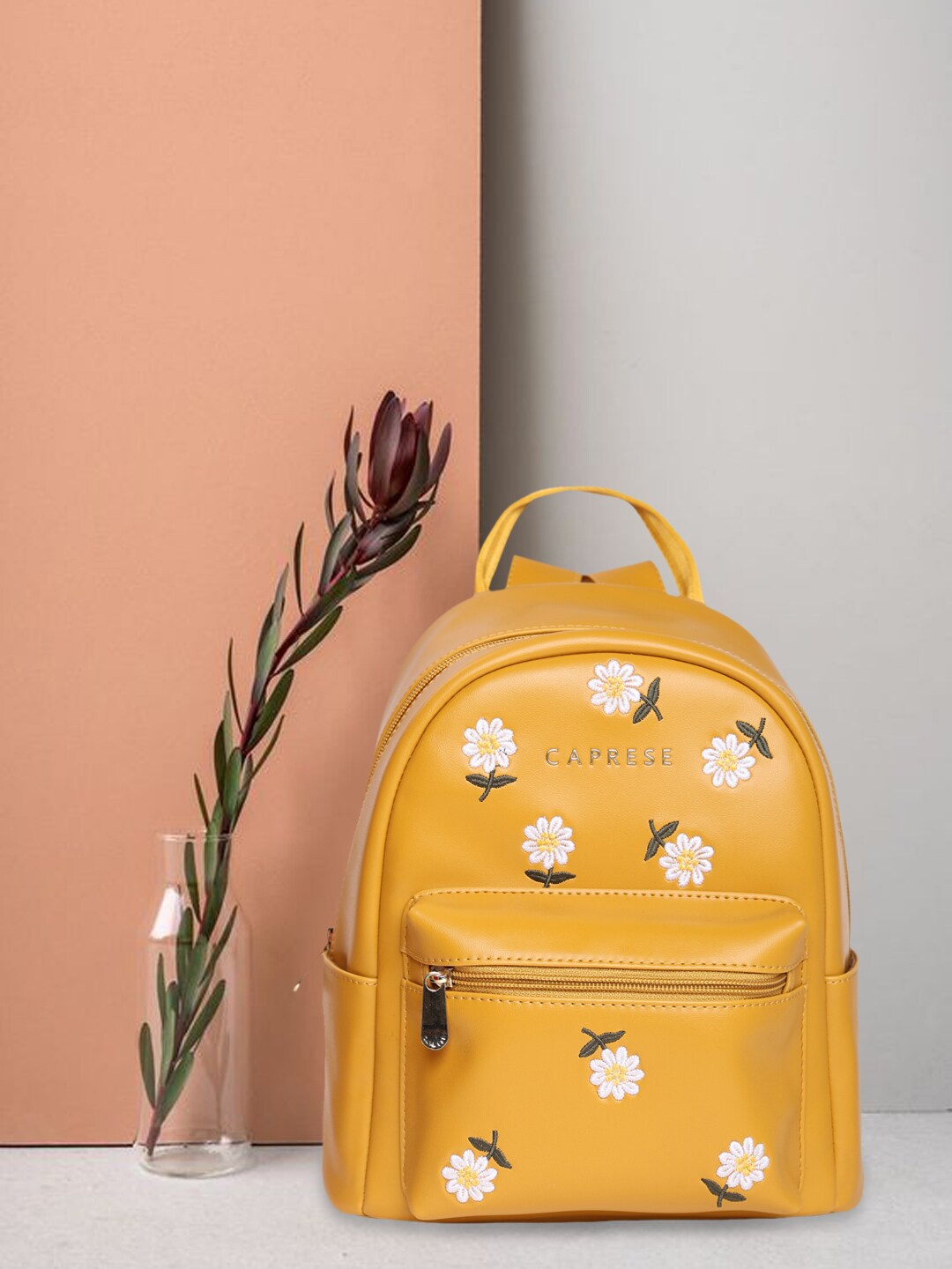 

Caprese Women Floral Printed Backpack, Orange