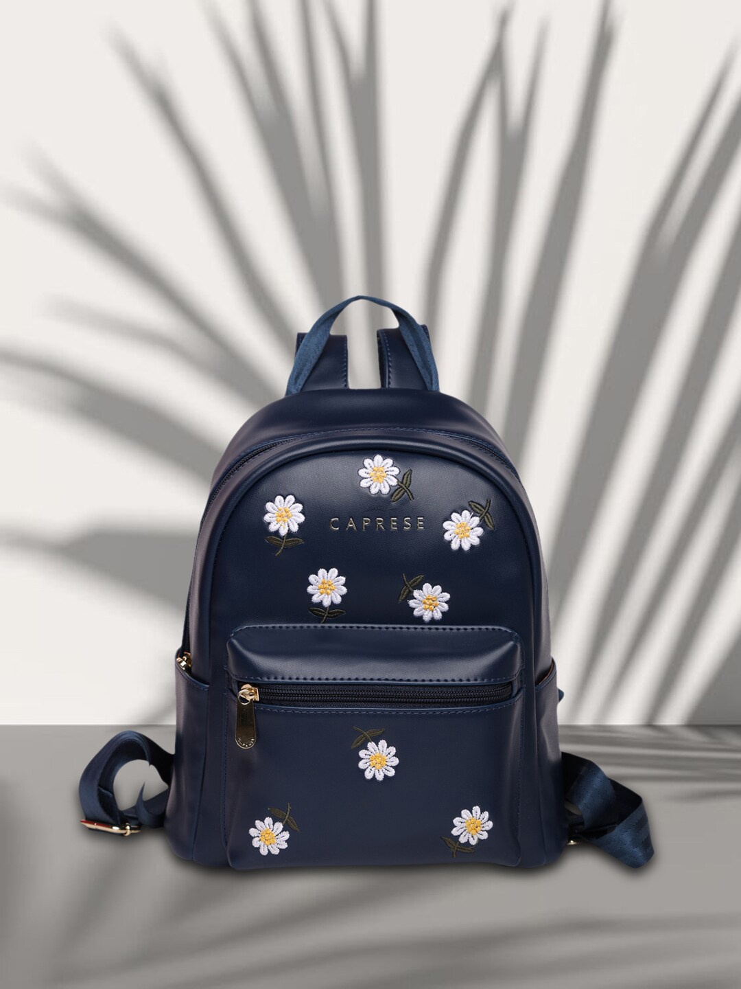 

Caprese Women Floral Printed Backpack, Blue