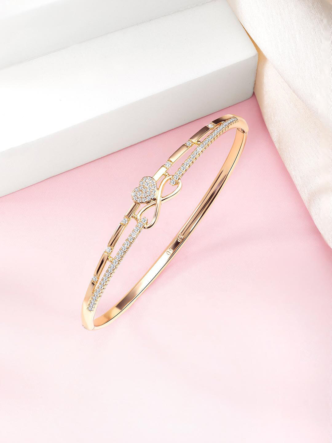 

Peora Gold-Plated Cubic Zirconia Stone Studded Brass Kada Bracelet