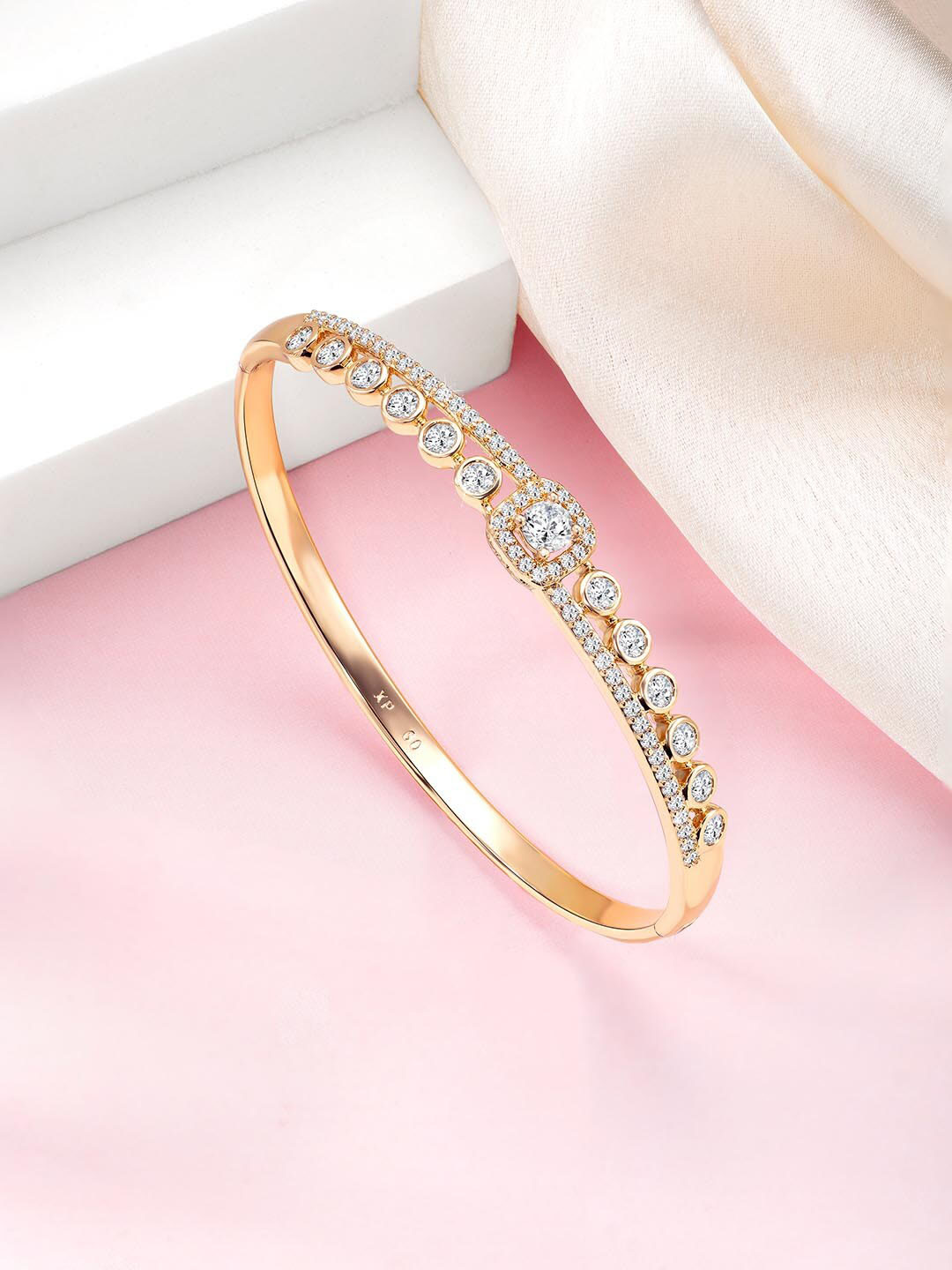 

Peora Gold-Plated Cubic Zirconia Stone Studded Brass Kada Bracelet