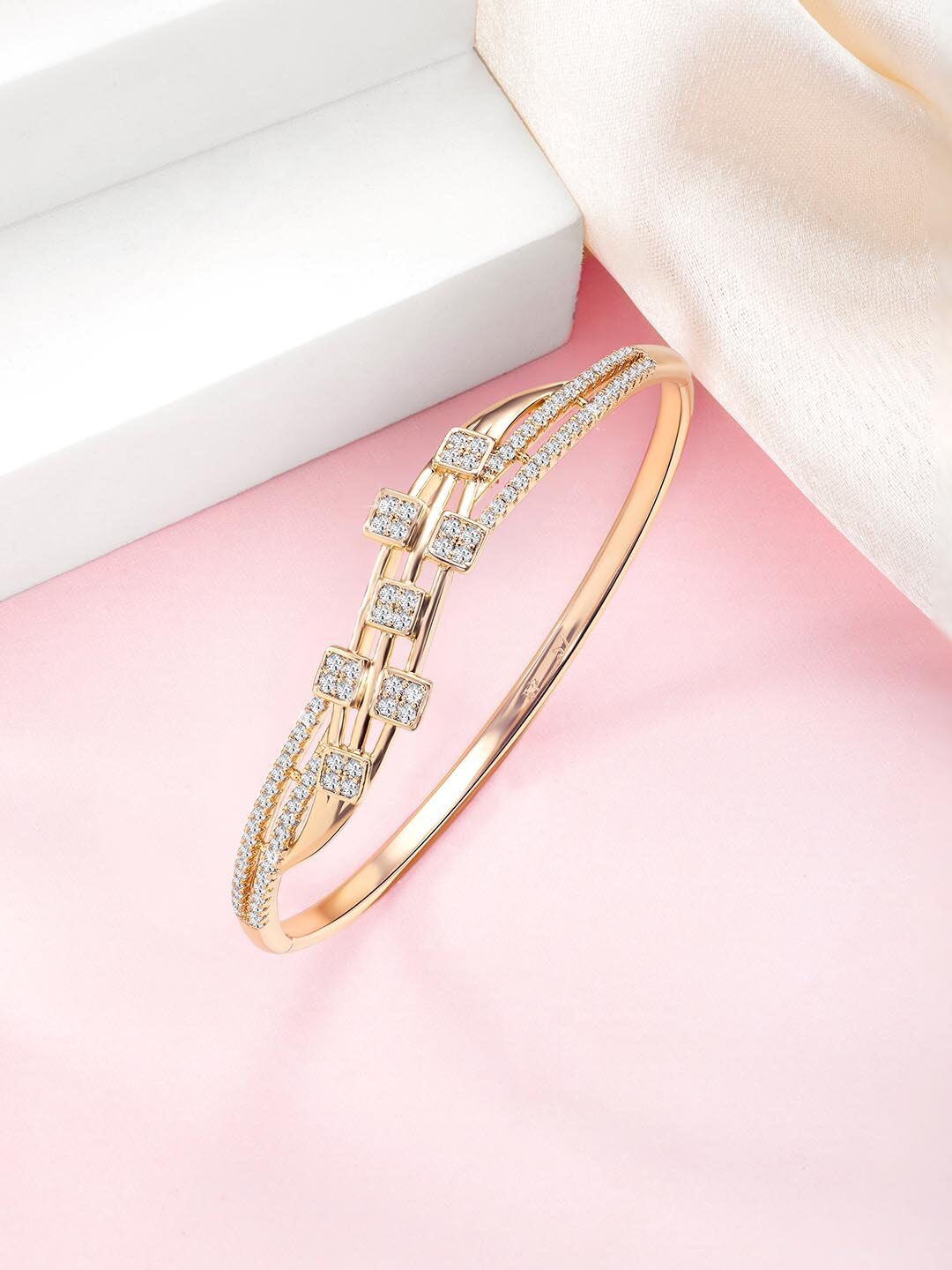 

Peora Gold-Plated Cubic Zirconia Stone Studded Brass Kada Bracelet
