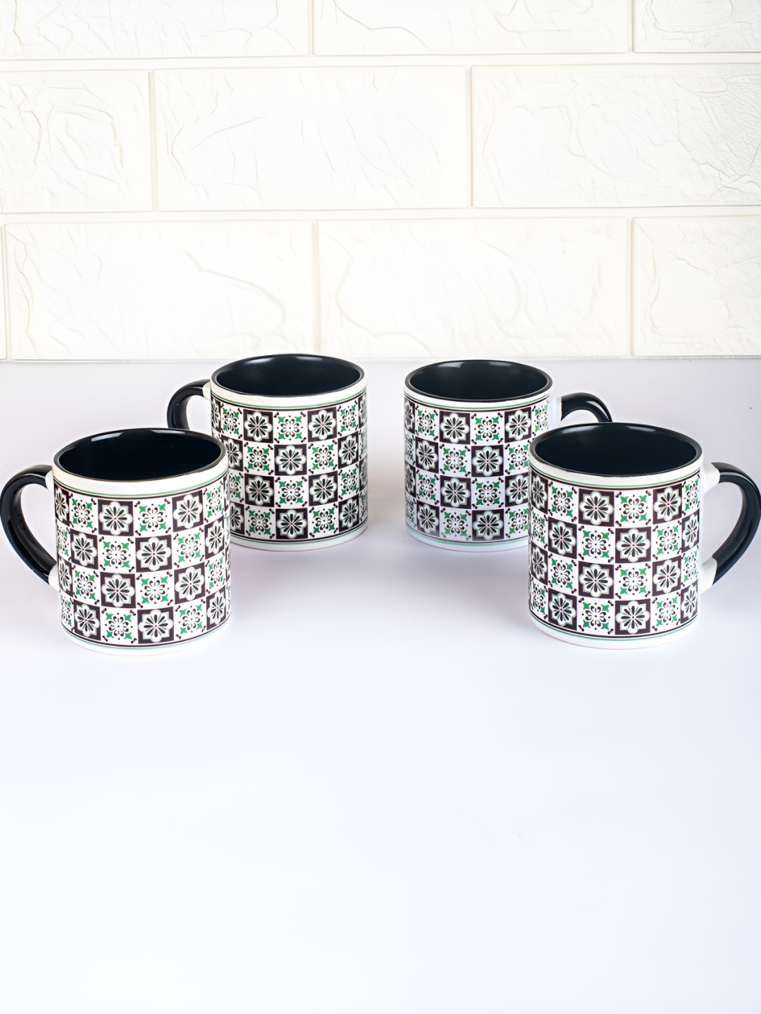 

Strokes by Namrata Mehta Black 4 Pcs Ethnic Motifs Printed Ceramic Glossy Mugs