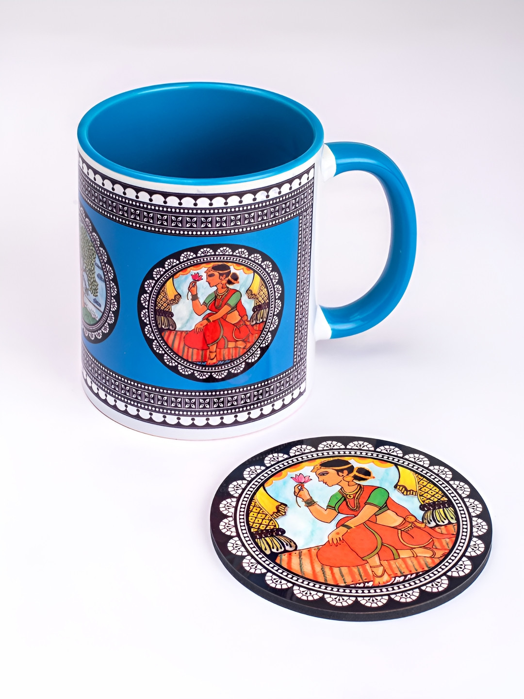 

Strokes by Namrata Mehta Blue Ethnic Motifs Printed Ceramic Glossy Mug with Coaster