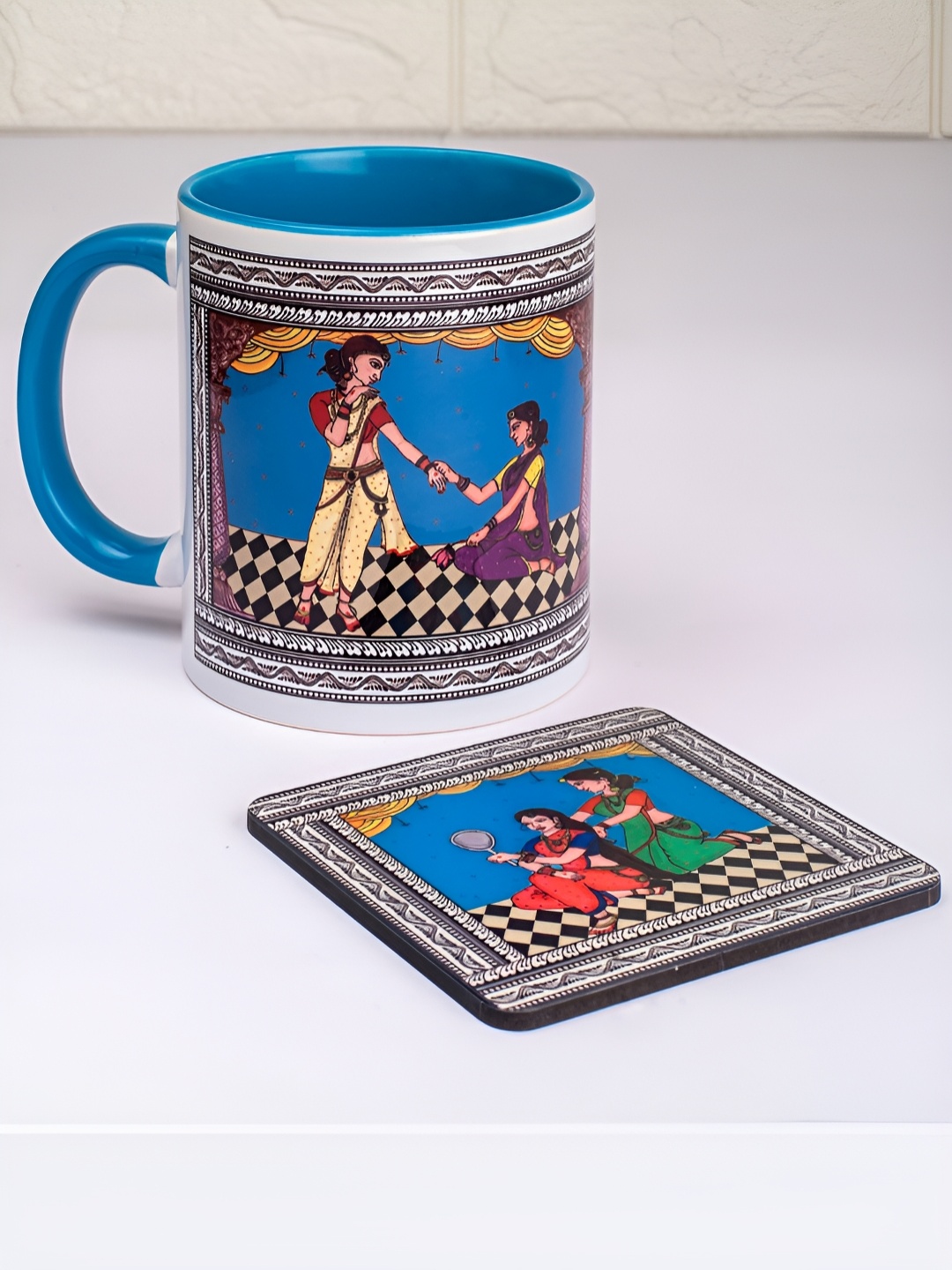 

Strokes by Namrata Mehta Blue Ethnic Motifs Printed Ceramic Glossy Mug with Coaster