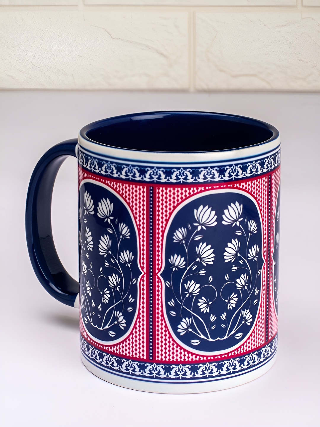 

Strokes by Namrata Mehta Red & Blue Ethnic Motifs Printed Ceramic Glossy Mugs