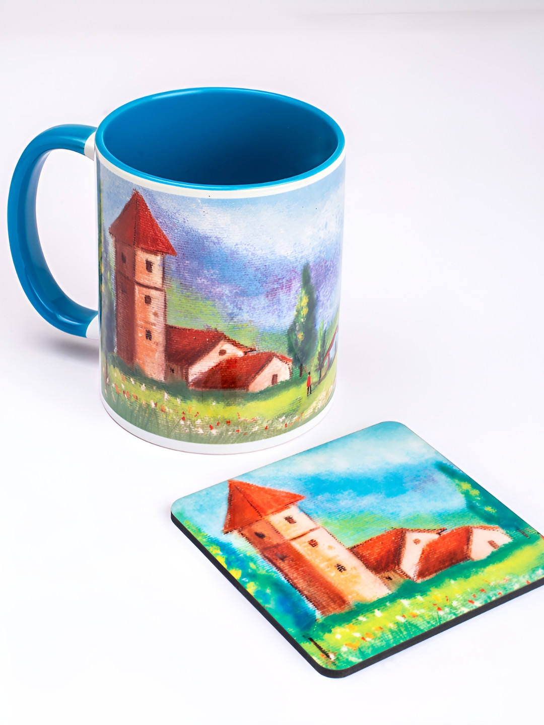 

Strokes by Namrata Mehta Blue Printed Ceramic Glossy Mug With Coaster