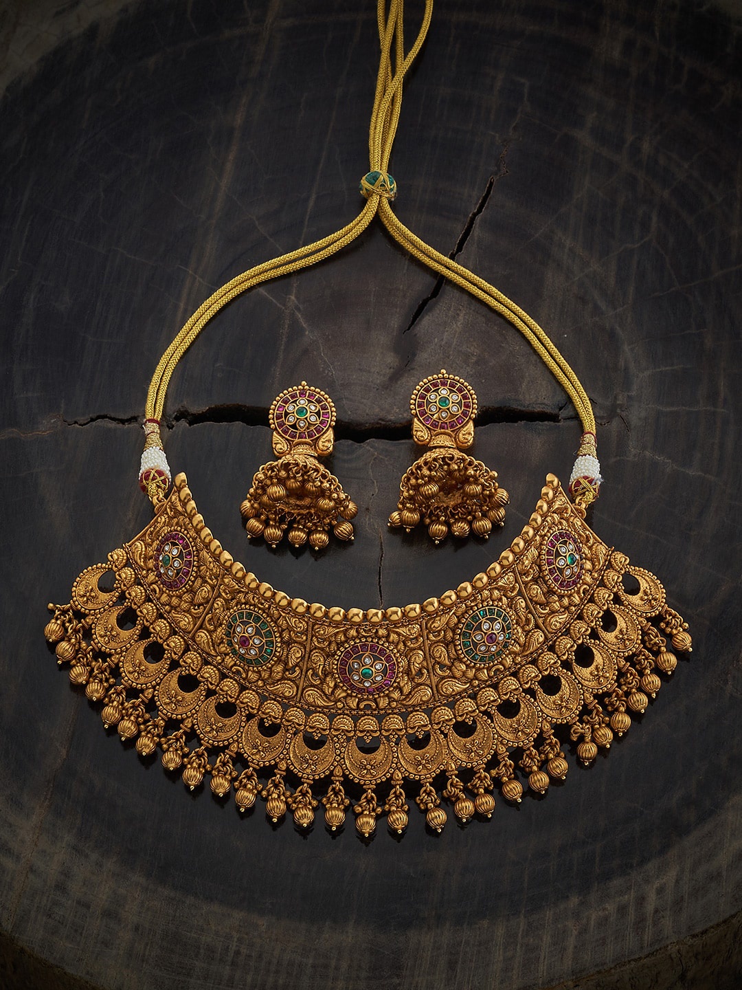 

Kushal's Fashion Jewellery Gold-Plated Stone Studded & Beaded Antique Jewellery Set