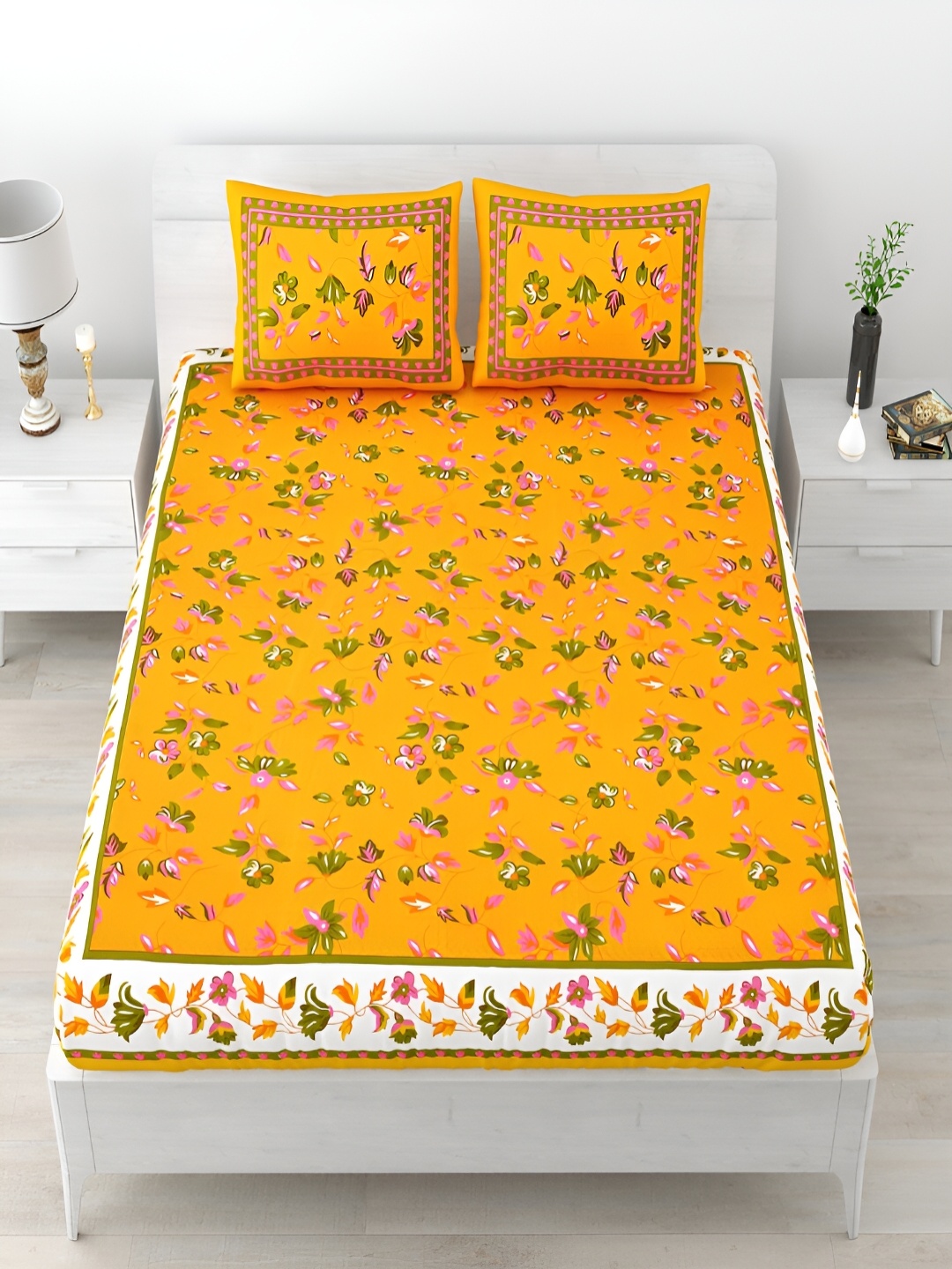 

Aura Yellow & White Floral Cotton 120 TC Queen Bedsheet with 2 Pillow Covers
