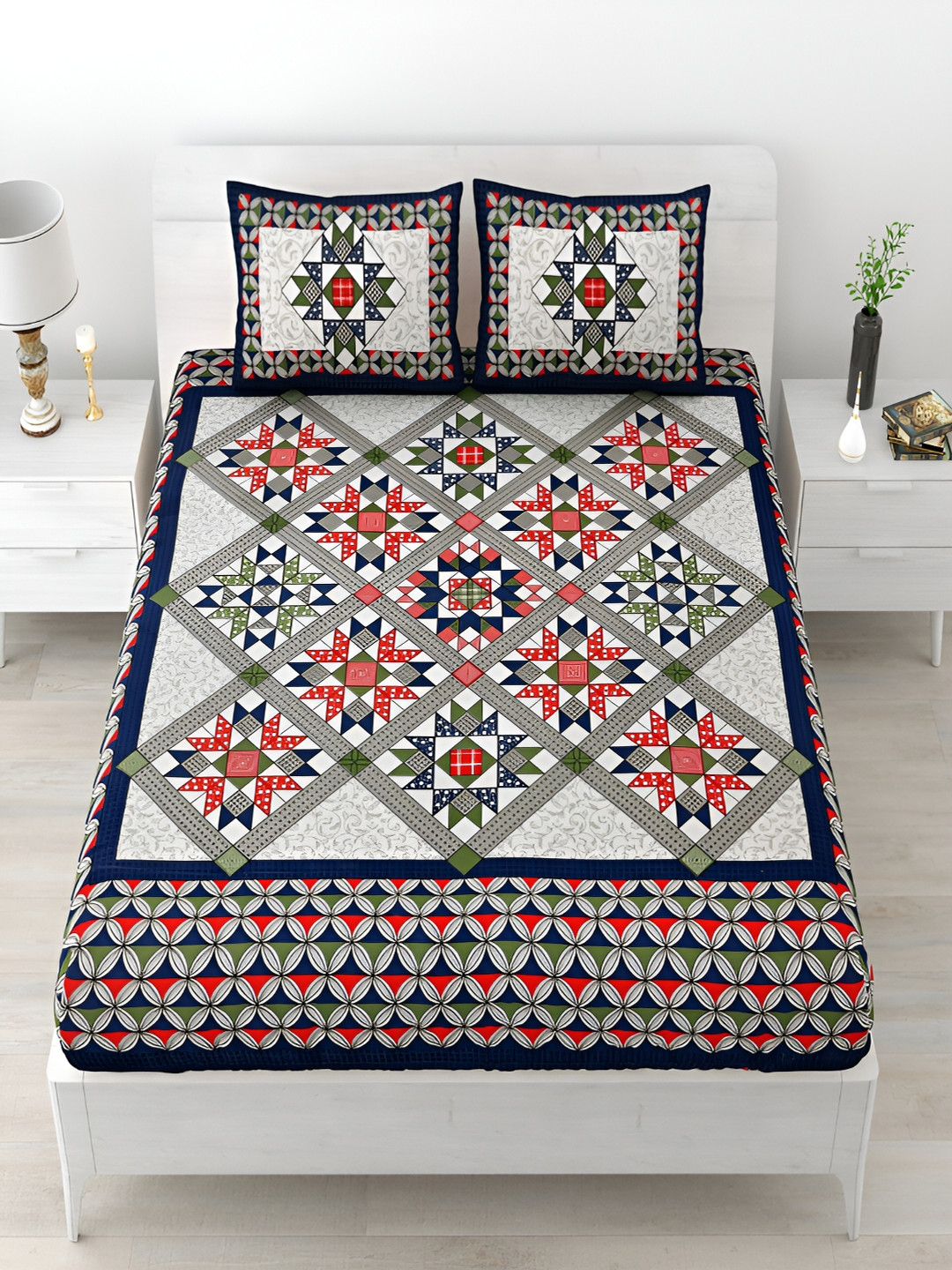 

Aura Blue & White Geometric Cotton 120 TC Queen Bedsheet with 2 Pillow Covers