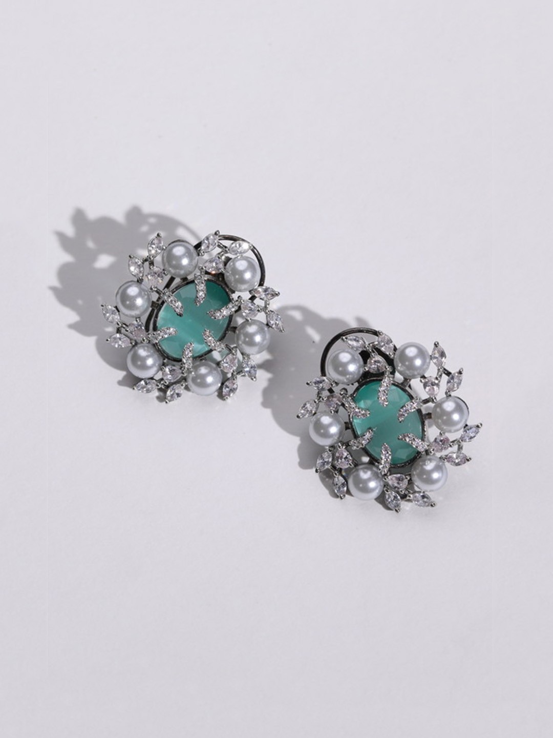 

MODARTA Brass Stone Studded Oval Studs Earrings, Silver