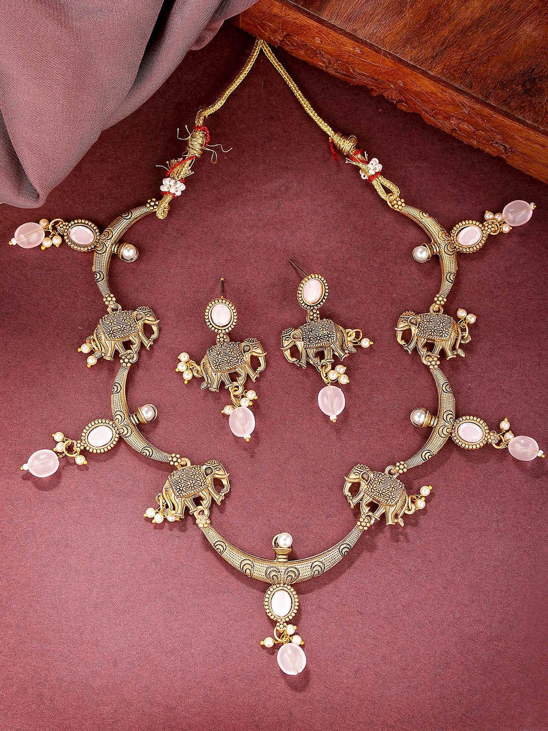 

KARATCART Gold Plated Kundan Studded & Beaded Elephant Design Jewellery Set