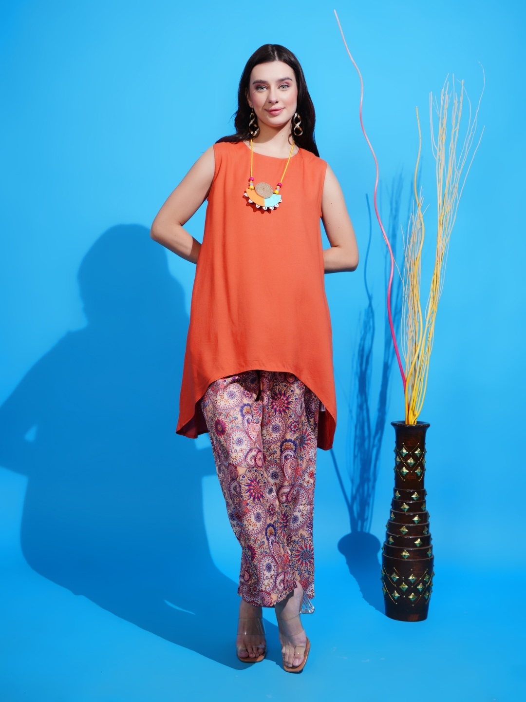 

Boholyfe Sunset Serenade Printed Round Neck Asymmetric Hem Top & Flared Trouser Co-Ords, Orange