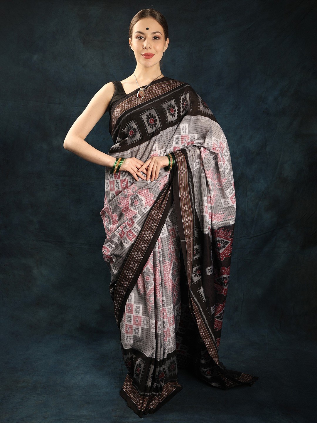 

Exotic India Floral Pure Cotton Ikat Saree, Grey