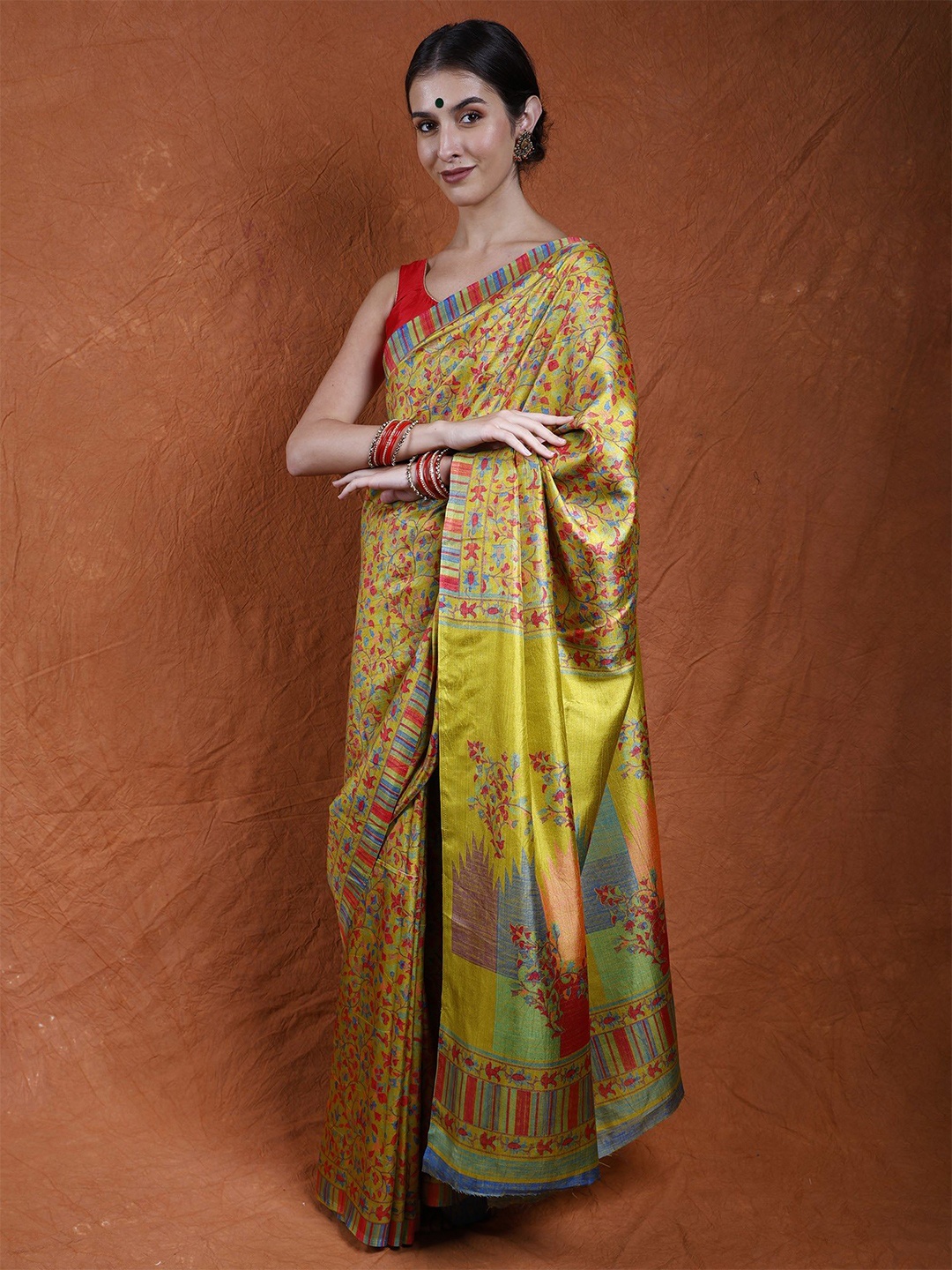 

Exotic India Art Silk Cress Green Saree with Multi-Colored Flowers Kani Print