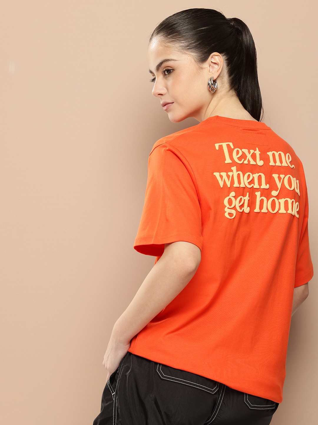 

Difference of Opinion Women Typography Printed Embossed Oversized T-shirt, Orange