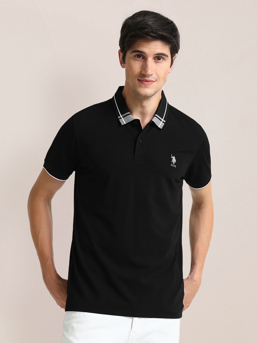 

U.S. Polo Assn. Men Solid Slim Fit Polo T-shirt, Black