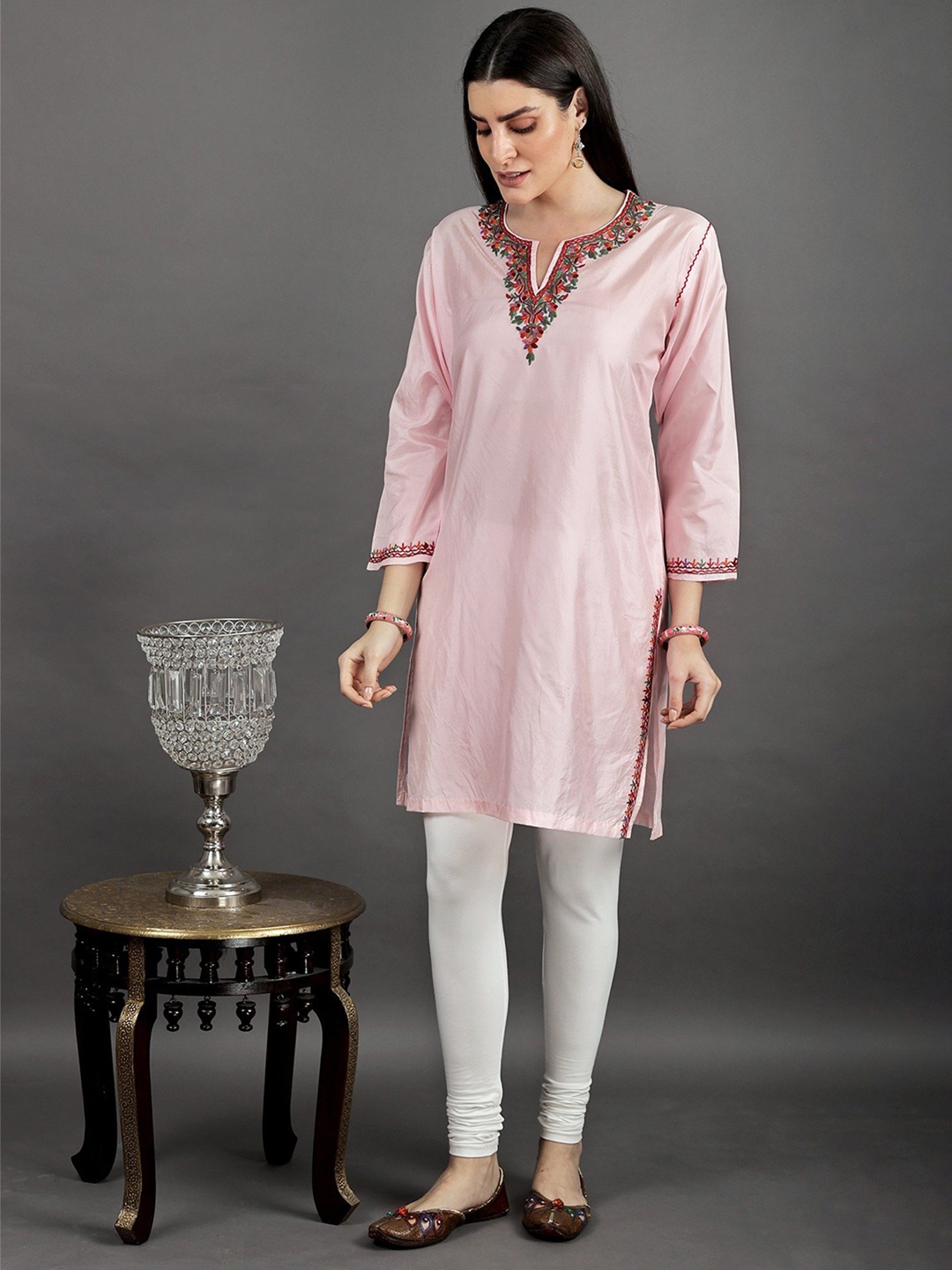 

Exotic India Silk Kashmiri Tickled Pink Kurti with Aari Embroidery By Hand