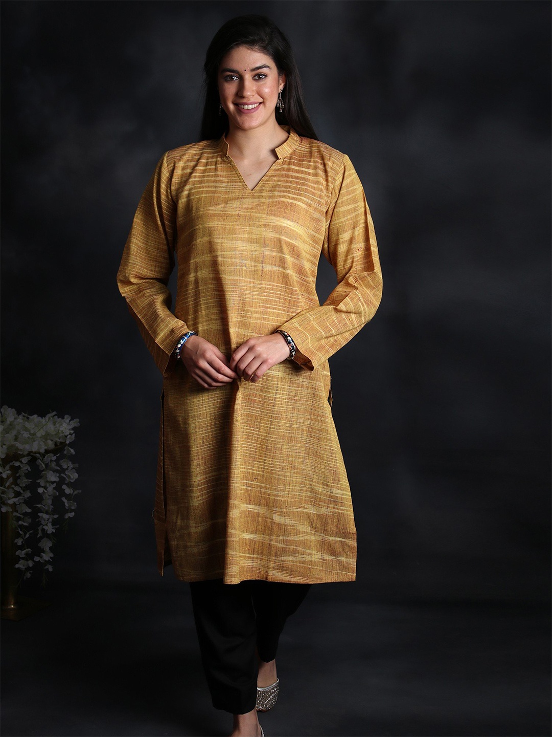 

Exotic India Khadi Cotton Kurti with Slub Texture, Mustard