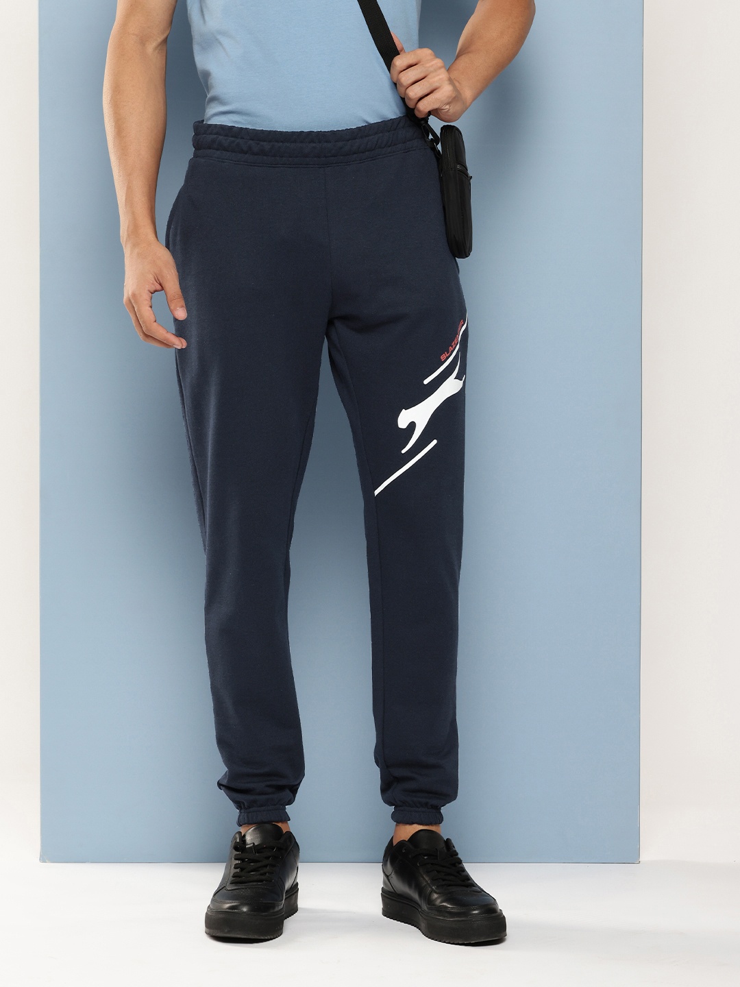 

Slazenger Men Brand Logo Printed Terry Sports Joggers, Navy blue