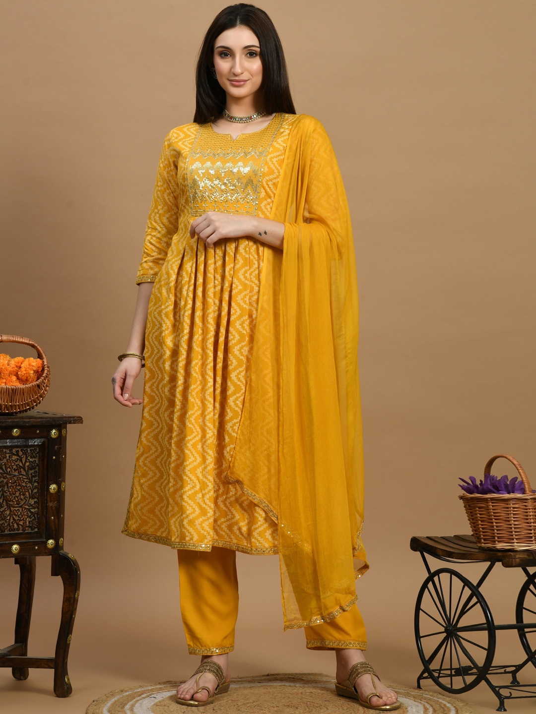 

VINDYAVASINI Geometric Printed Round Neck Anarkali Kurta with Trousers & With Dupatta, Mustard