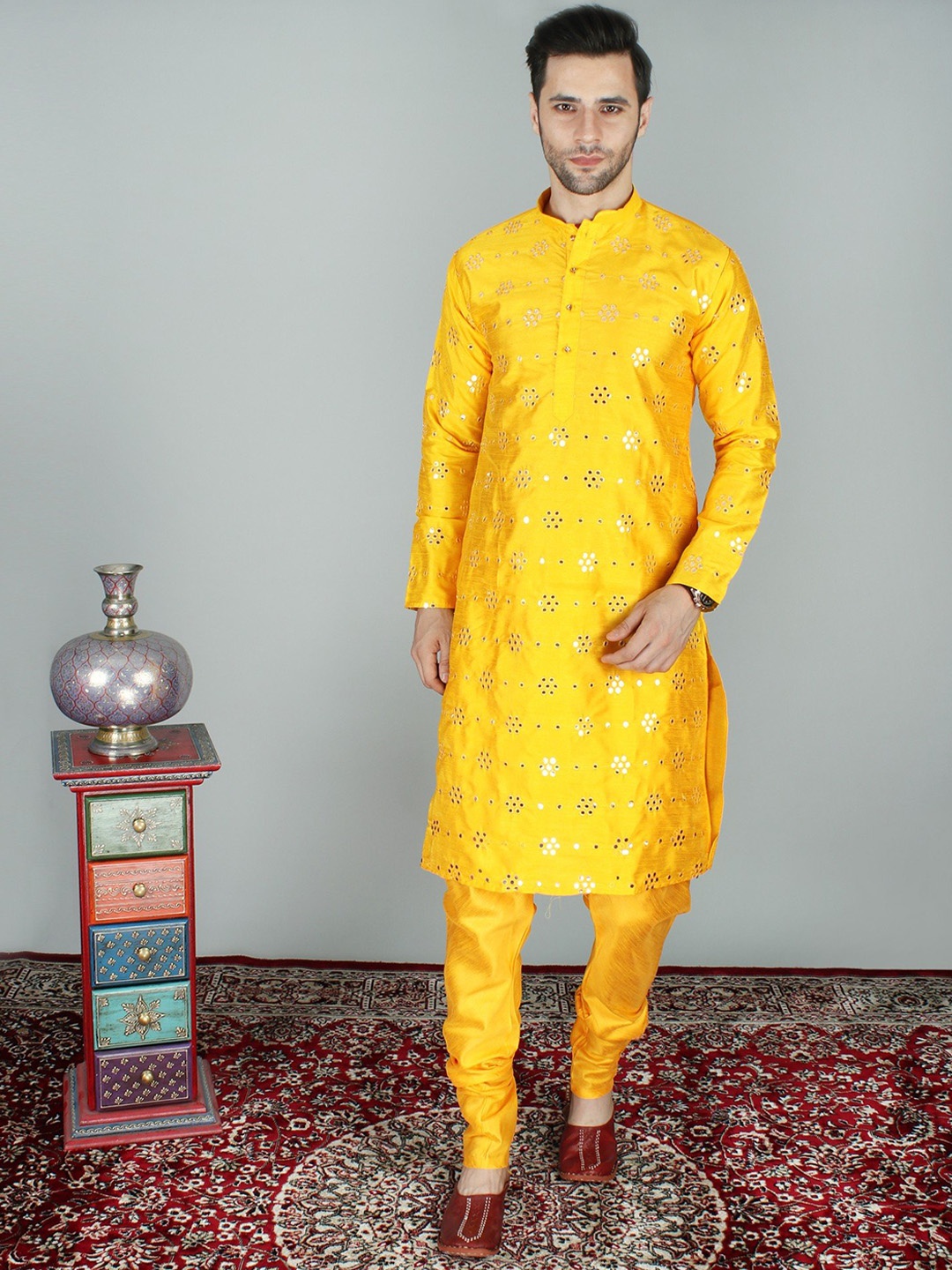 

Exotic India Art Silk Abhala with Thread Detailing Mirror Work Kurta with Churidar, Yellow