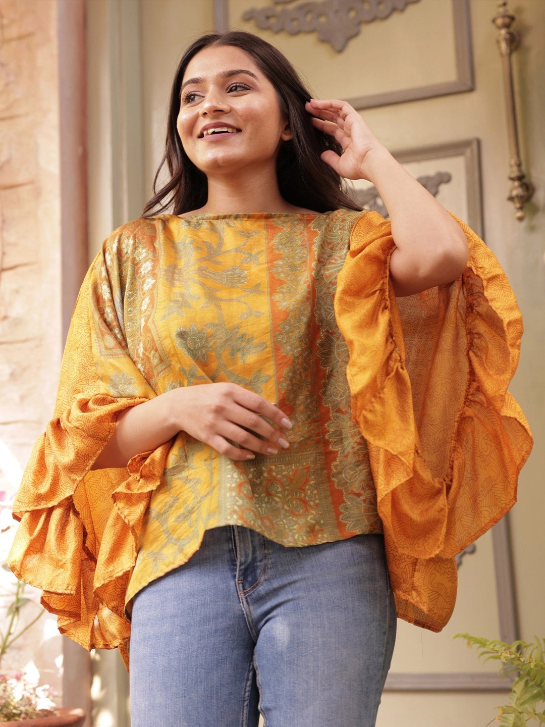 

Exotic India Batwing Sleeve Ruffles Round Neck Pure Silk Top, Yellow