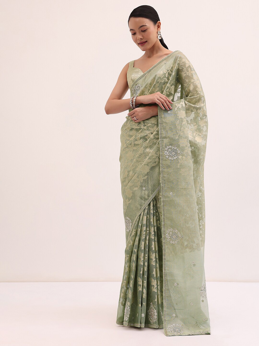 

KALKI Fashion Woven Design Zari Tissue Saree, Green