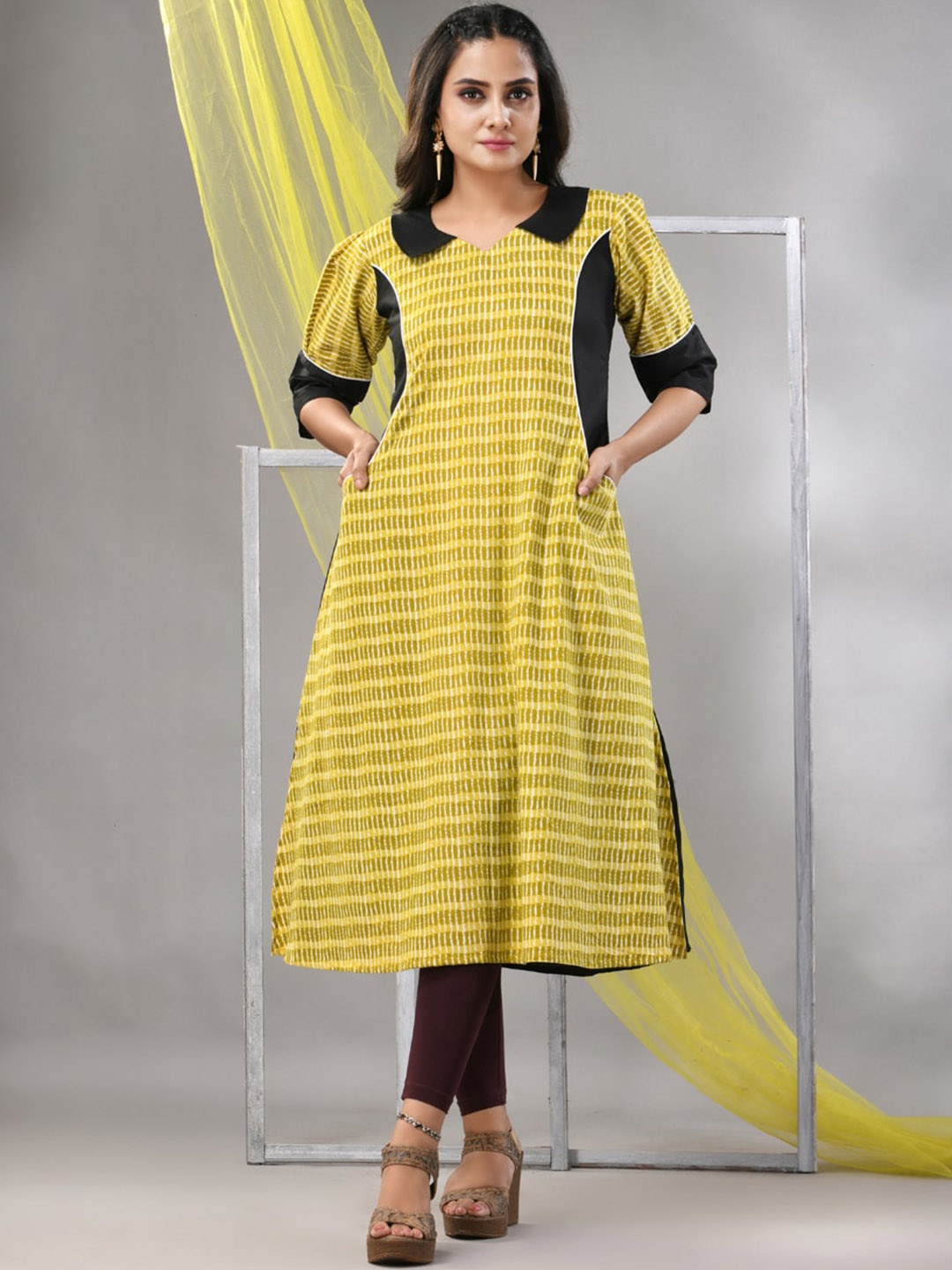 

Charukriti Striped V-Neck Puff Sleeves Cotton A-Line Kurta, Yellow