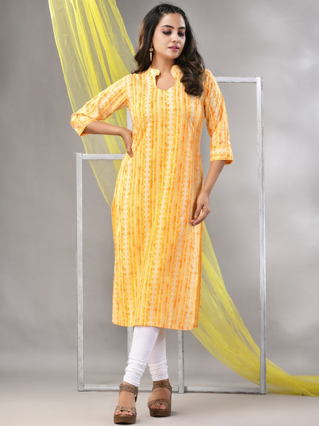 

Charukriti Geometric Printed Panelled A-Line Kurta, Yellow