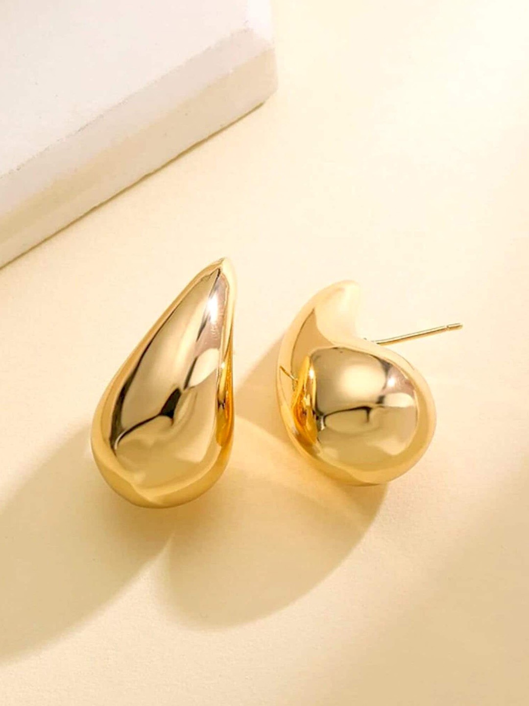 

Xivir Stainless Steel Gold-Plated Contemporary Studs Earrings