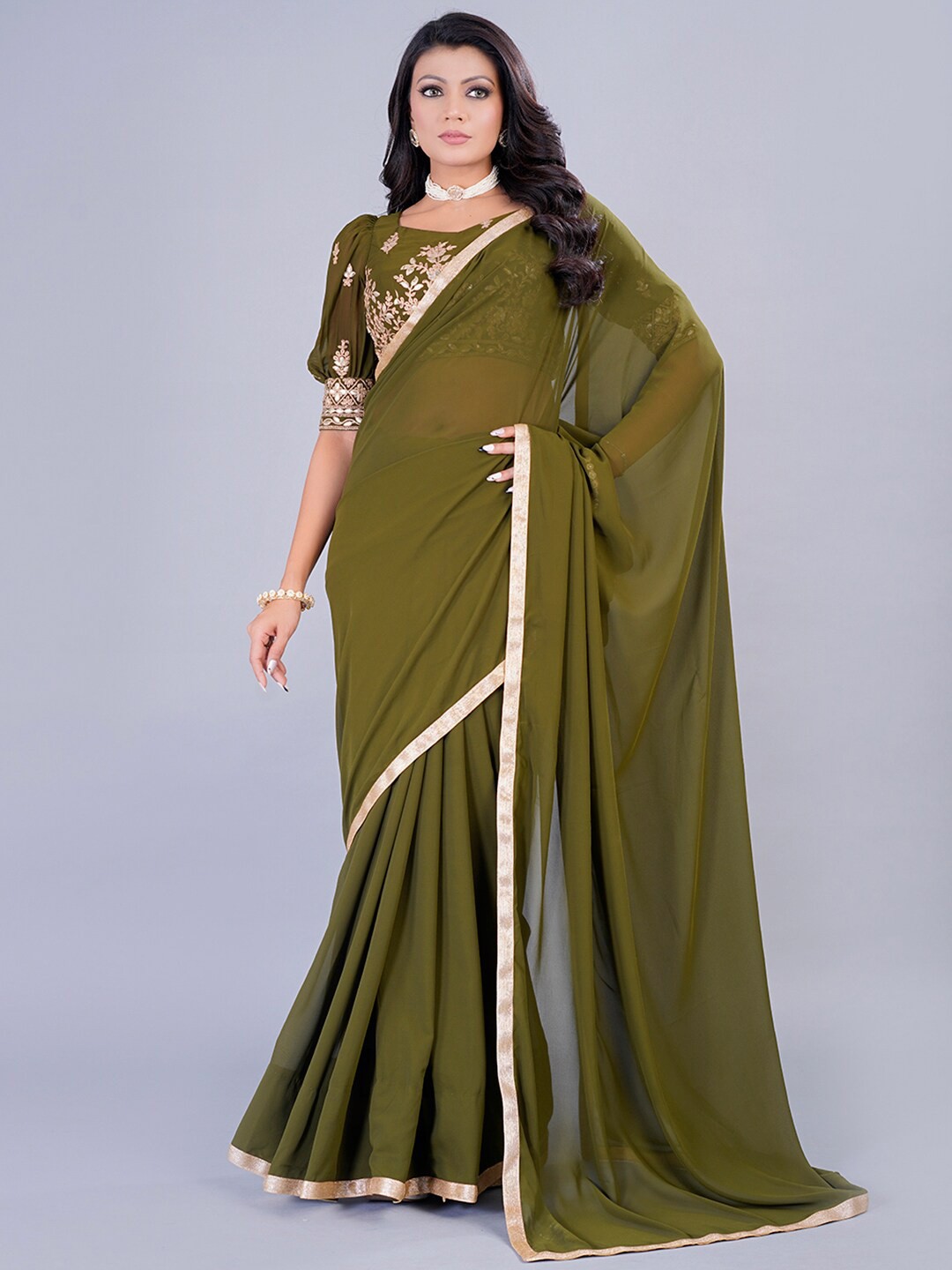 

Ethnovog Solid Poly Georgette Saree, Green
