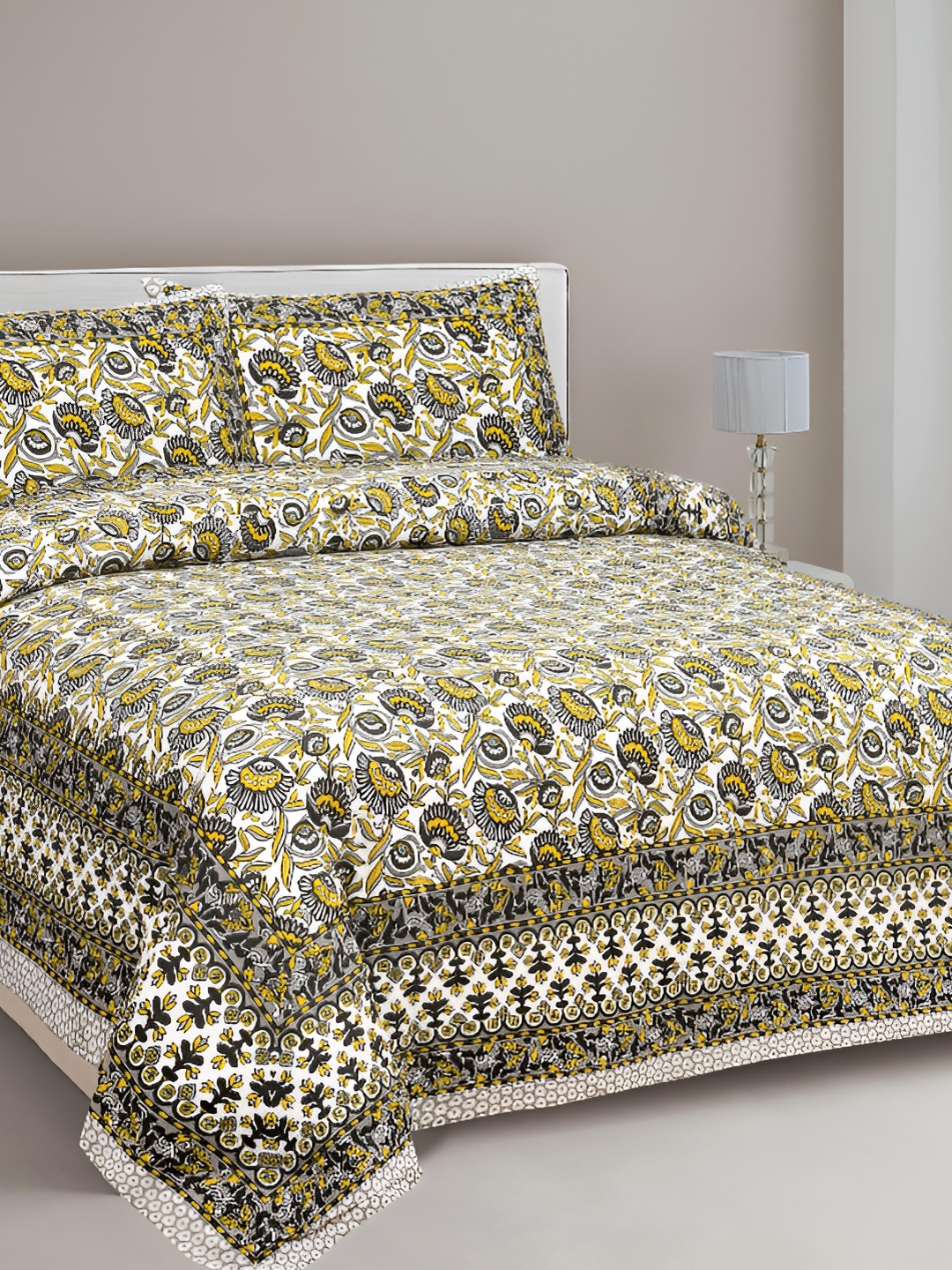 

Lali Prints Yellow & Grey Floral 210 TC Cotton King Bedsheet with 2 Pillow Covers