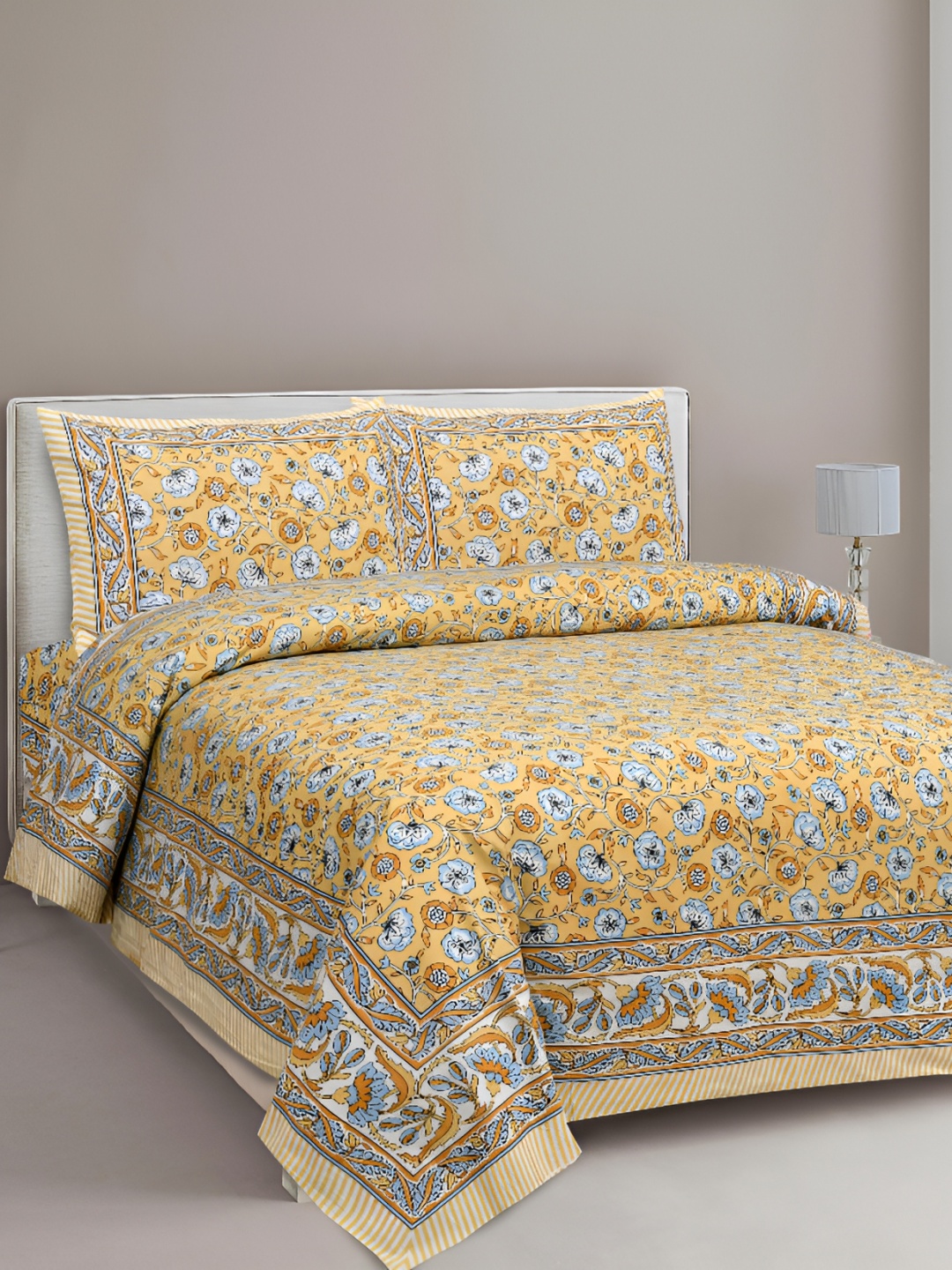

Lali Prints Yellow & Blue Floral 210 TC Cotton King Bedsheet with 2 Pillow Covers