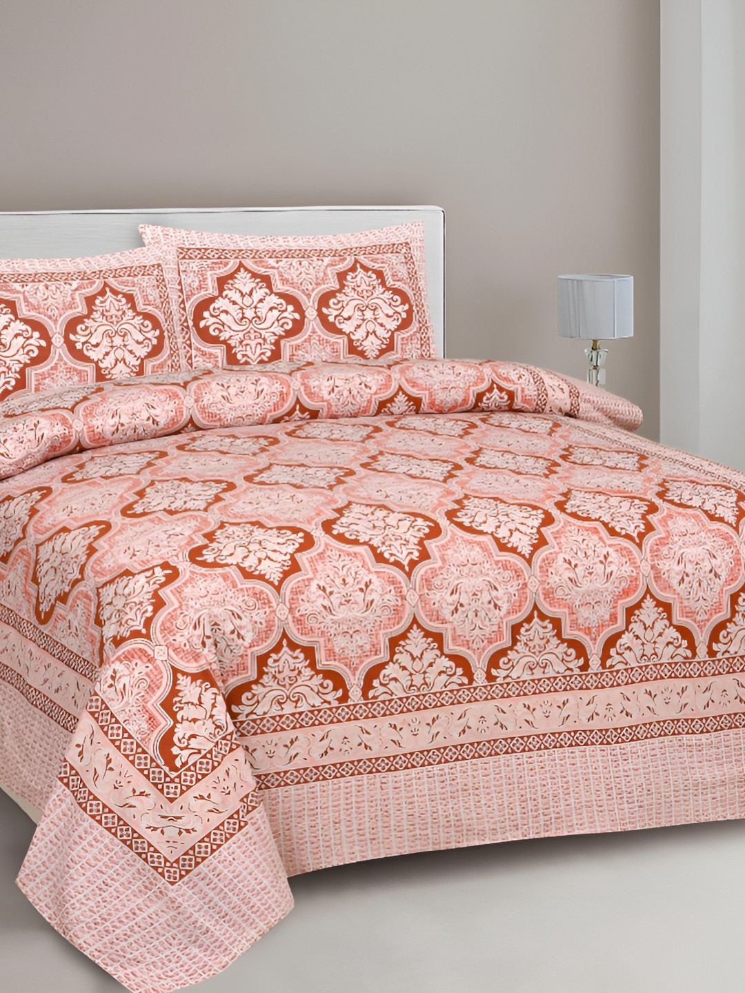 

Lali Prints Peach & White Ethnic Motifs 210 TC Cotton King Bedsheet with 2 Pillow Covers