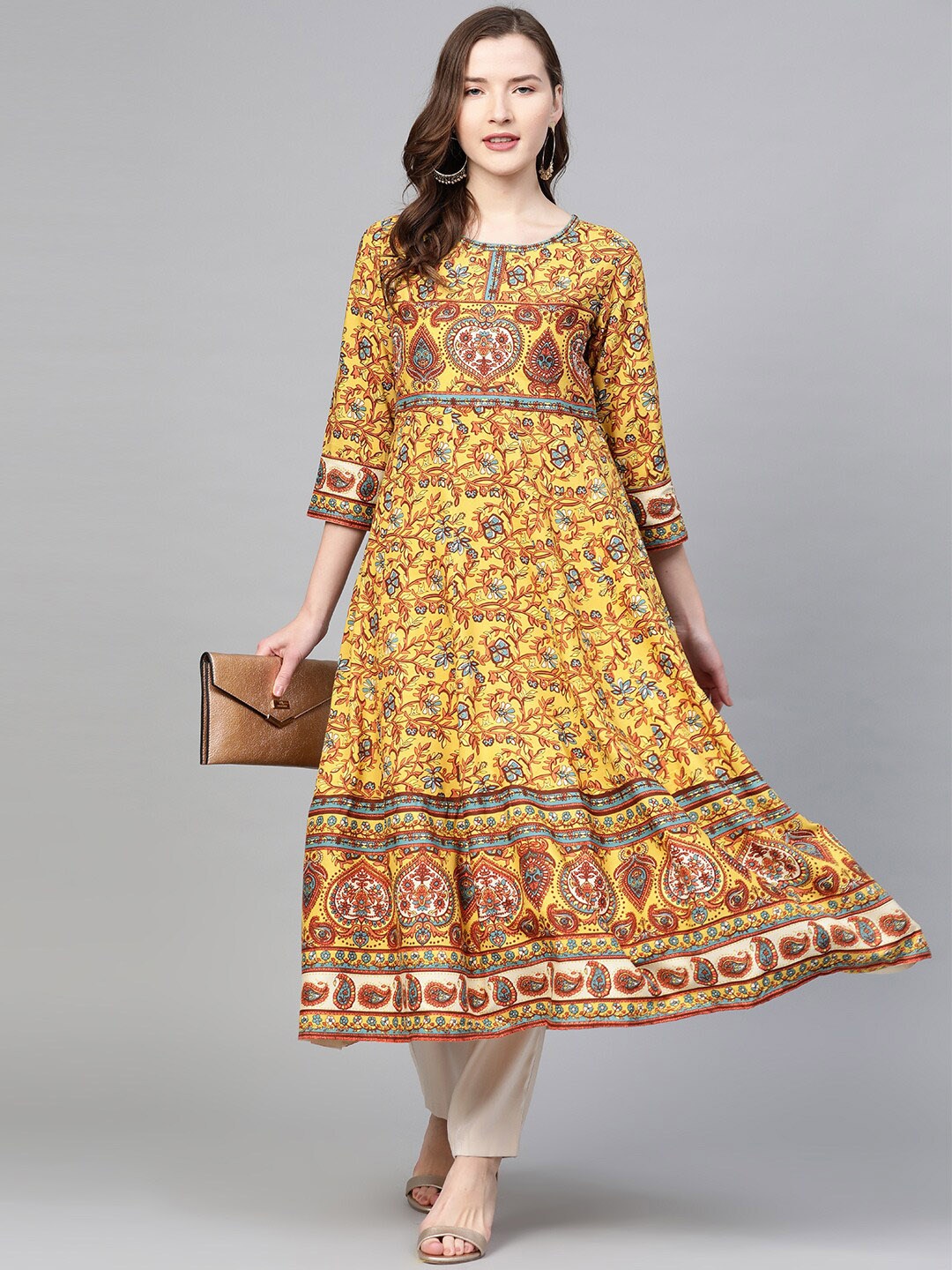 

KALINI Paisley Embroidered Flared Sleeves Sequinned Anarkali Kurta, Mustard