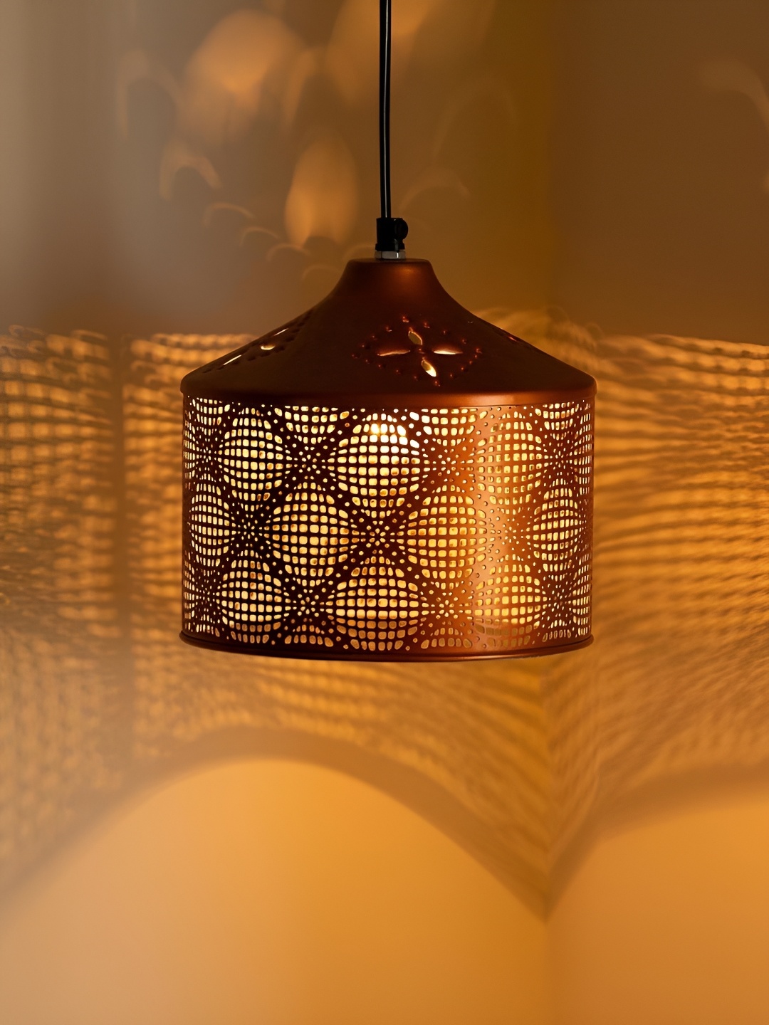 

ExclusiveLane Copper Toned Hand Etched Cylindrical Shaped Iron Ceiling Lamp