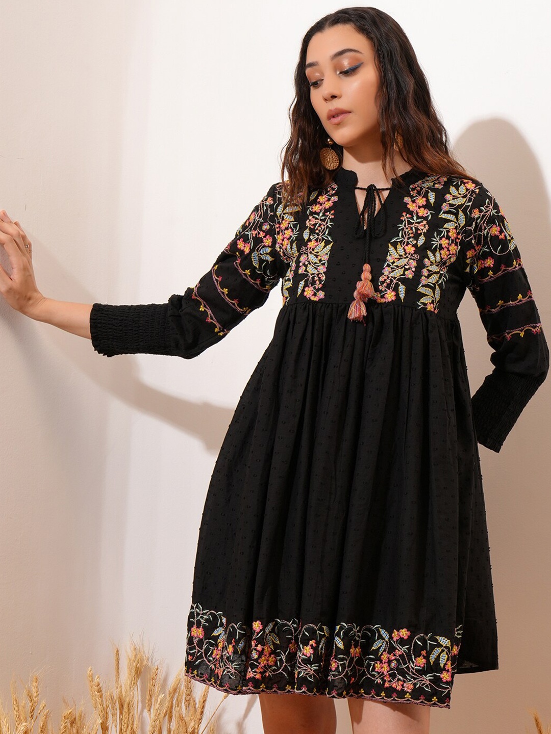 

Vishudh Black Floral Embroidered Tie-Up Neck Gathered Cotton A-Line Dress