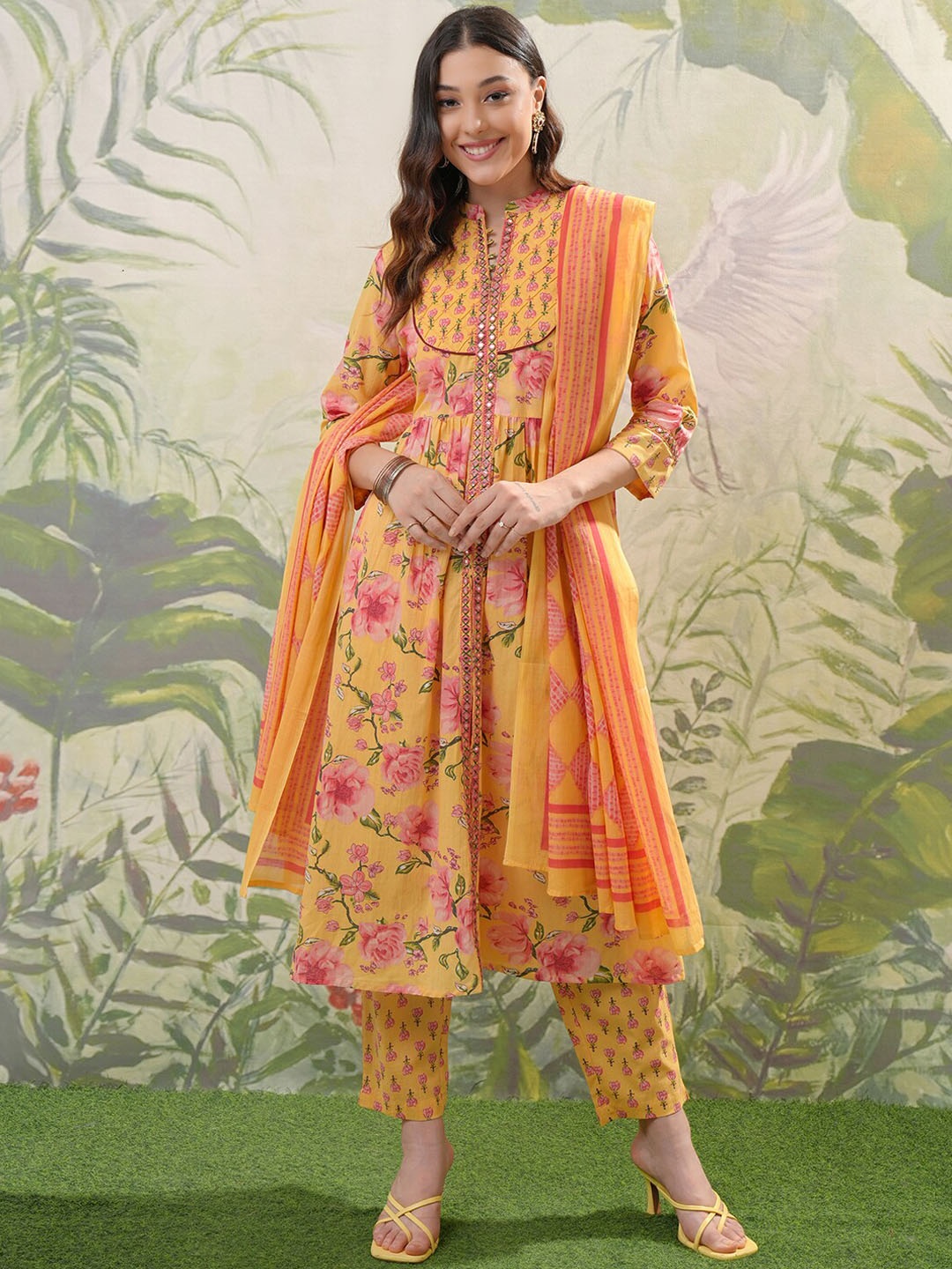 

Vishudh Mustard Yellow Printed Mirror Work Cotton A-Line Kurta With Trousers & Dupatta