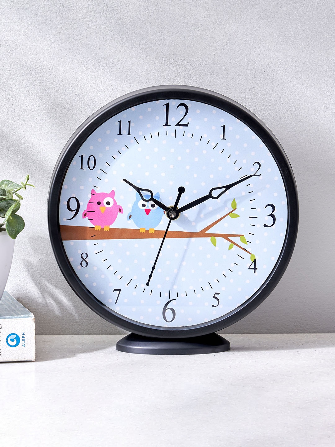 

Home Centre White & Pink Printed Contemporary Round Shaped Wall Clock