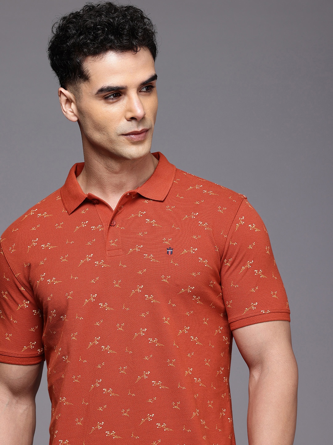 

Louis Philippe Jeans Floral Printed Polo Collar Pure Cotton Slim Fit T-shirt, Rust