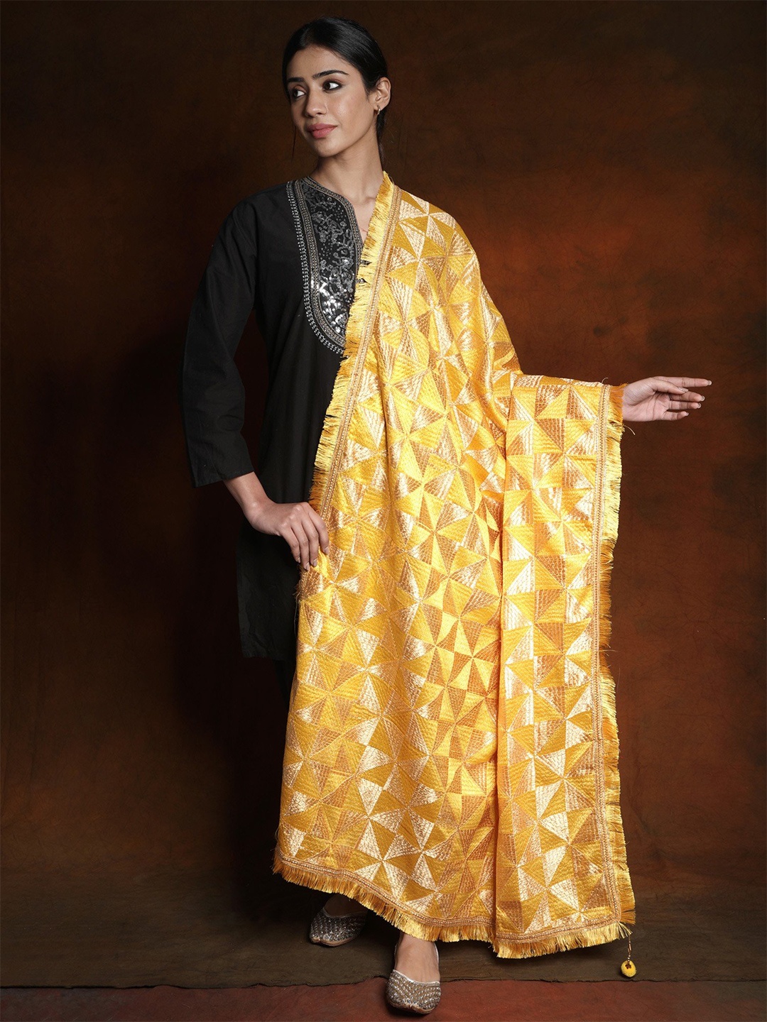 

Exotic India Golden Rod Phulkari Thread Embroidered Jhalar Border Silk Dupatta, Gold